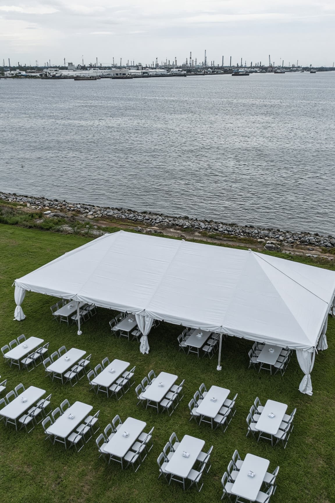 Elegant tented reception with long dining tables